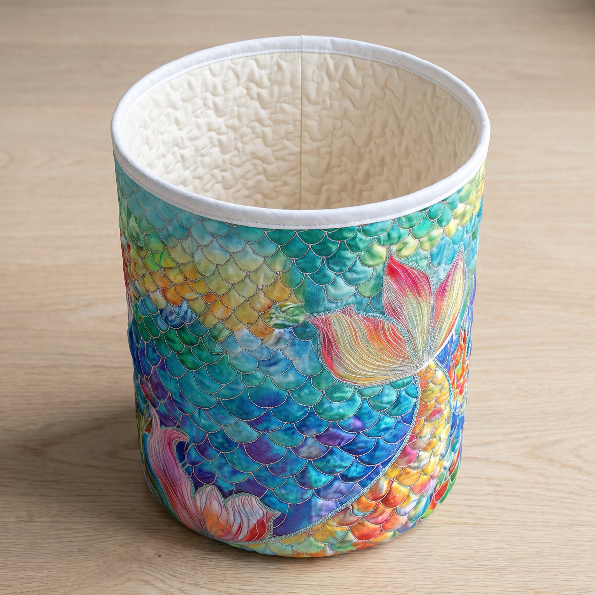 Quilted Laundry Basket - Marine Sparkle — open, showing the plain cream quilted lining