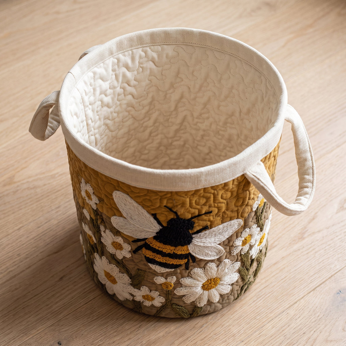 Quilted Laundry Basket - Daisy & Bee — open, showing the plain cream quilted lining