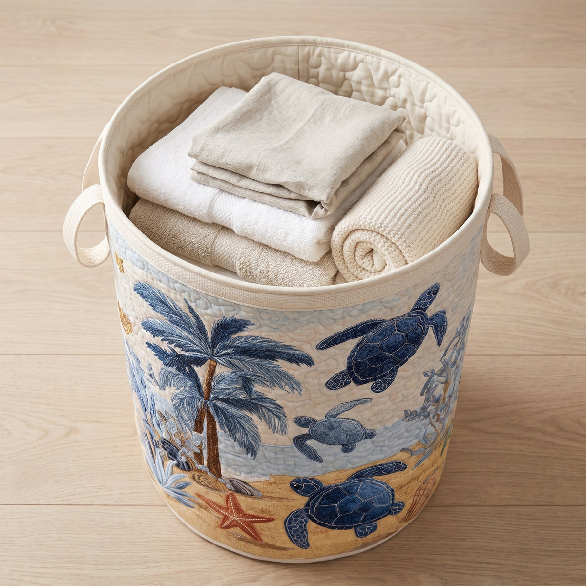 Quilted Laundry Basket - Sea Turtle — filled with folded towels and laundry