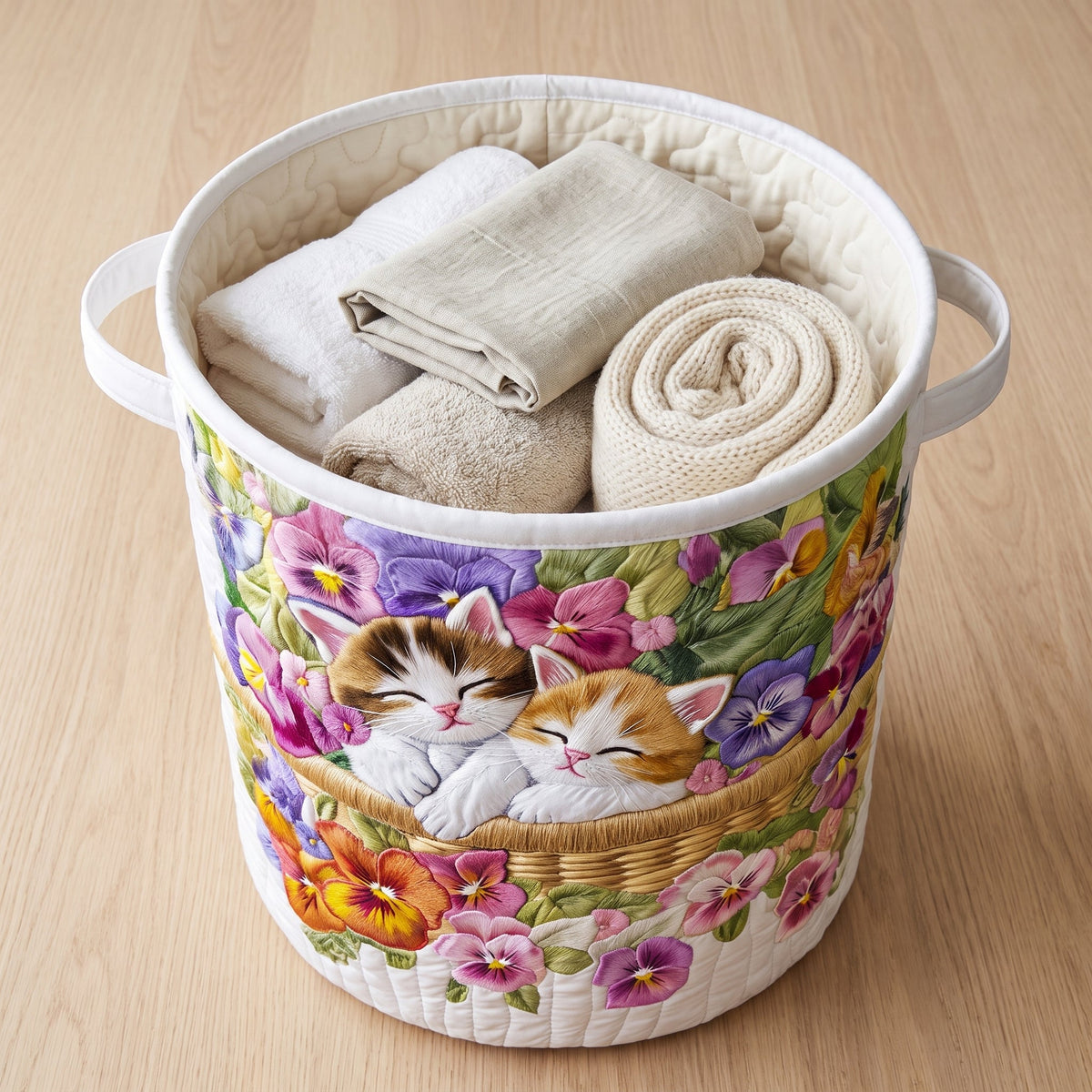 Quilted Laundry Basket - Feline Chaos — filled with folded towels and laundry