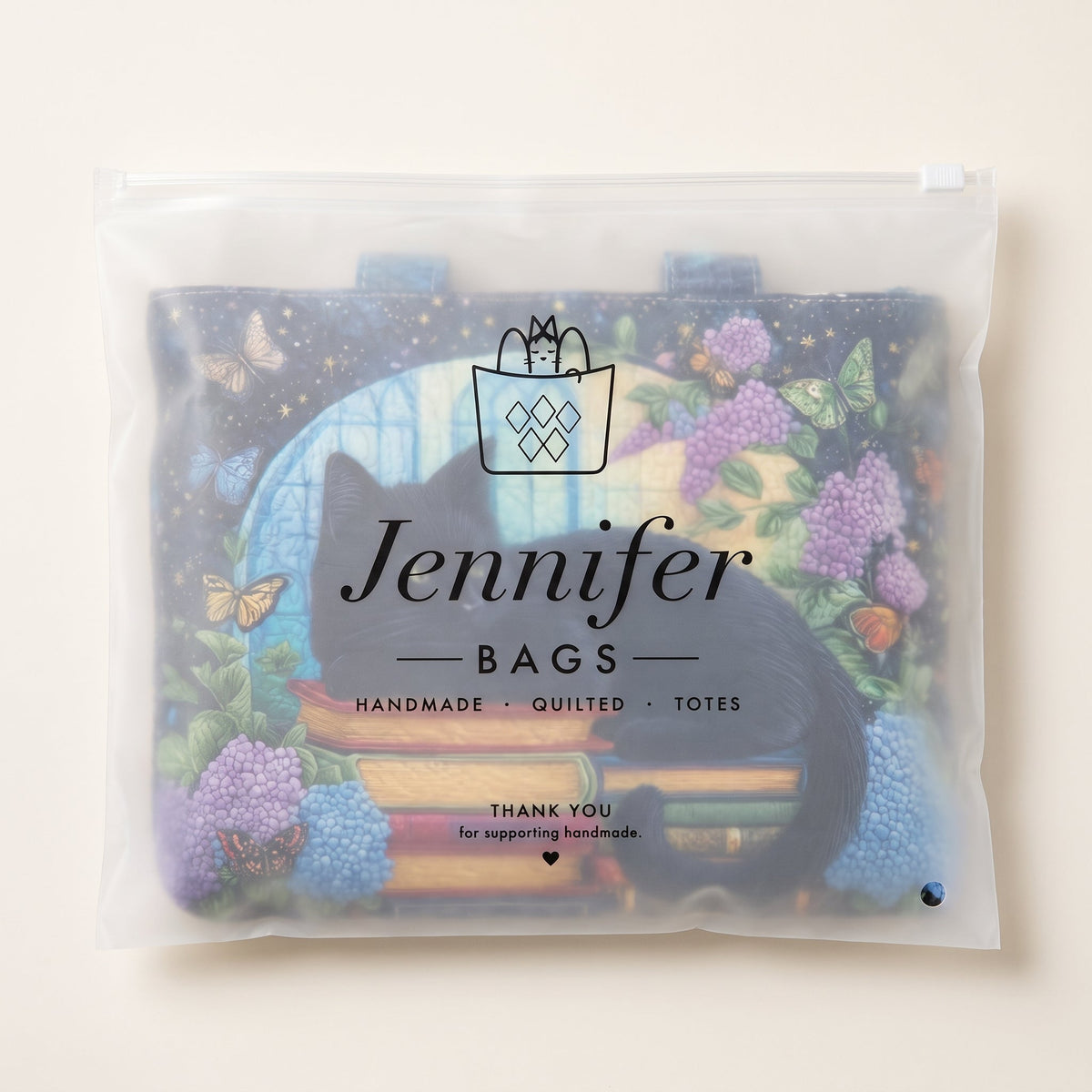 Artisanal Bag - Black Cat on Books — packaged in its pouch