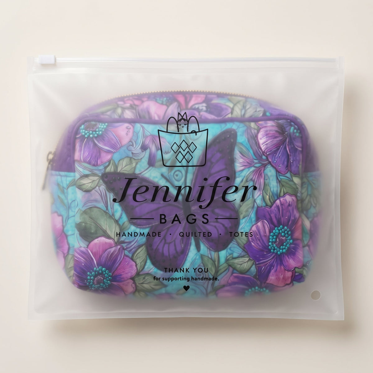 Butterfly Bloom Quilted Makeup Bag — packaged in its pouch