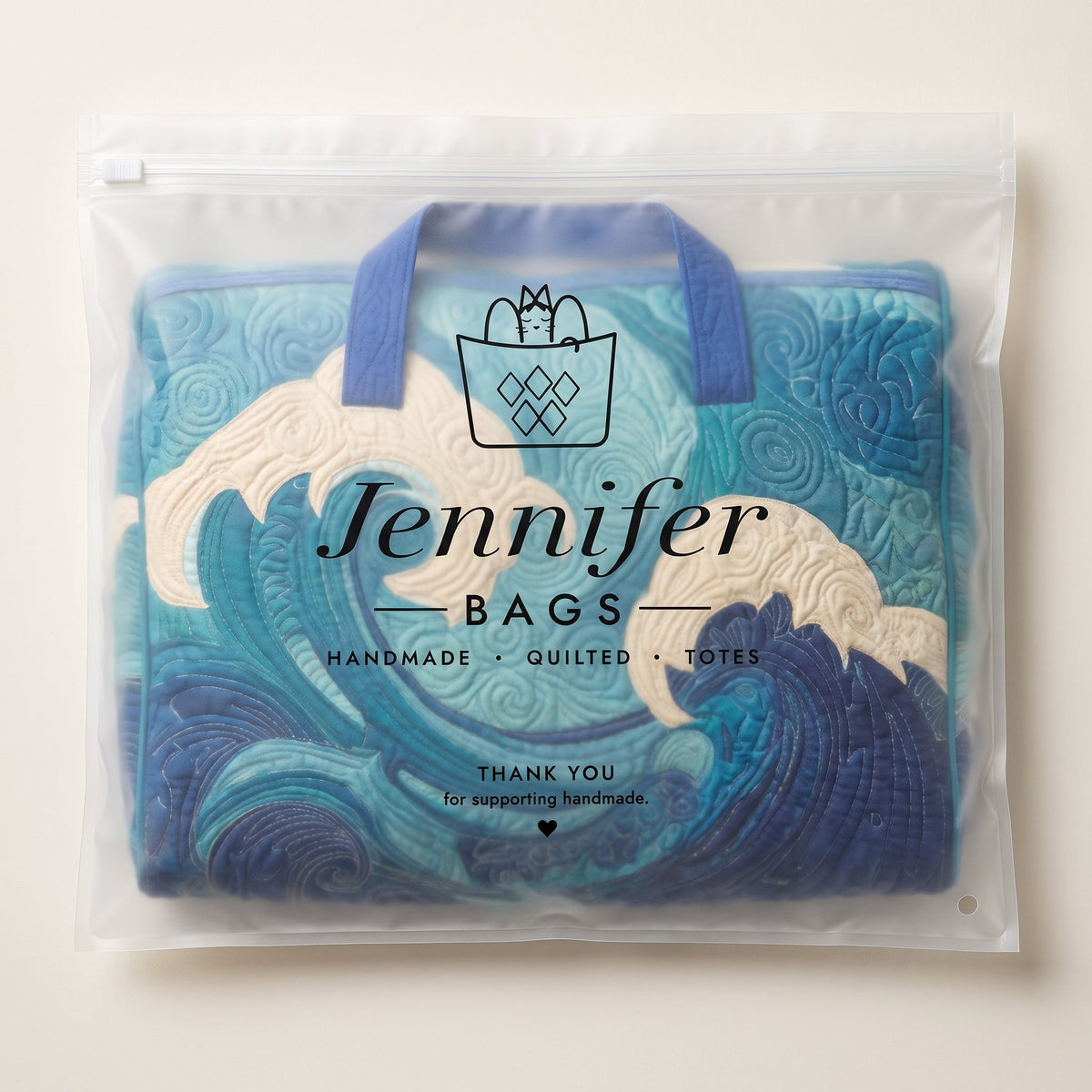 Rising Wave Quilted Duffle Bag — packaged in its pouch