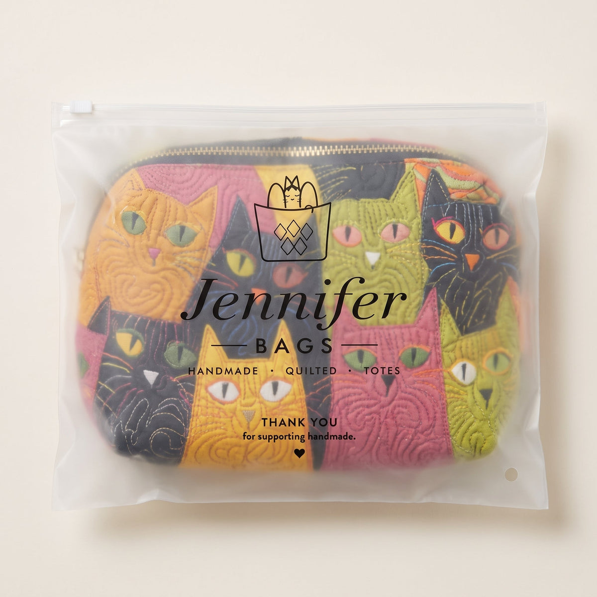 Cat Garden Quilted Makeup Bag — packaged in its pouch